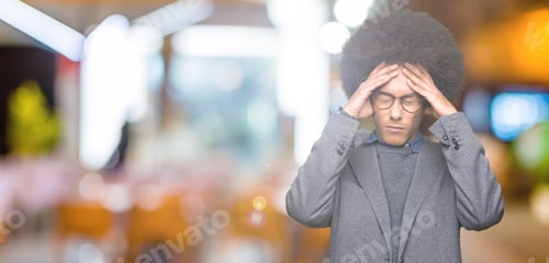 Preview: Young African American Business Man With Afro Hair Wearing Glasses Suffering From Headache