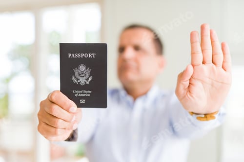 Preview: Middle Age Man Holding Holding Passport Of United States With Open Hand Doing Stop Sign With