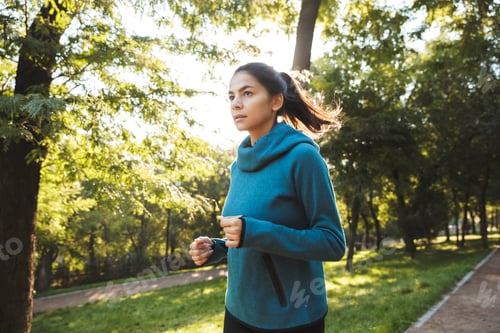 Preview: Beautiful Young Fitness Woman Wearing Sportswear Jogging At The Park Outdoors
