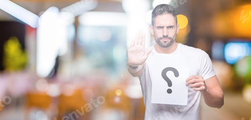 Preview: Handsome Young Man Holding Paper With Question Mark Over Isolated Background With Open Hand Doing
