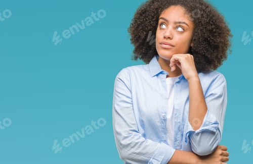 Preview: Young Afro American Woman Over Isolated Background With Hand On Chin Thinking About Question