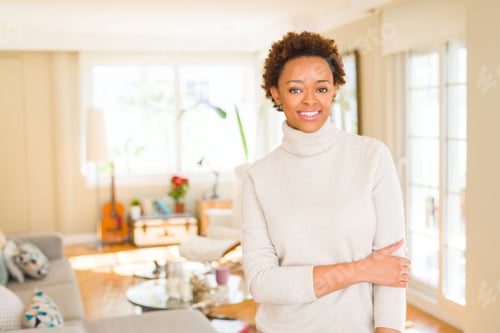 Preview: Beautiful Young African American Woman Smiling Confident To The Camera Showing Teeth With Crossed