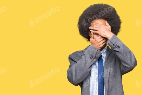 Preview: Young African American Business Man With Afro Hair Wearing Glasses Covering Eyes And Mouth With