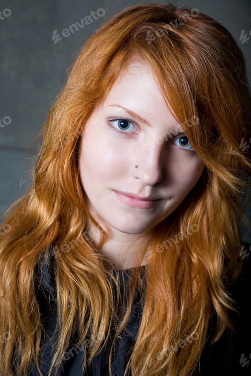 Preview: Disillusioned Smile - Moody Portrait Of Beautiful Young Redhead Girl.