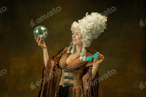 Preview: Ready For Party. Portrait Of Medieval Young Woman In Vintage Clothing With Discoball, Eyewear On