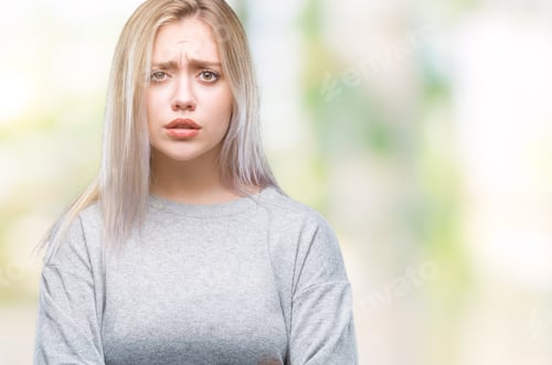Preview: Young Blonde Woman Over Isolated Background Skeptic And Nervous, Disapproving Expression On Face