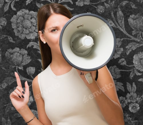 Preview: Young Woman Holding Megaphone Against A Vintage Background