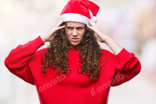 Preview: Young Brunette Girl Wearing Christmas Hat Over Isolated Background Suffering From Headache