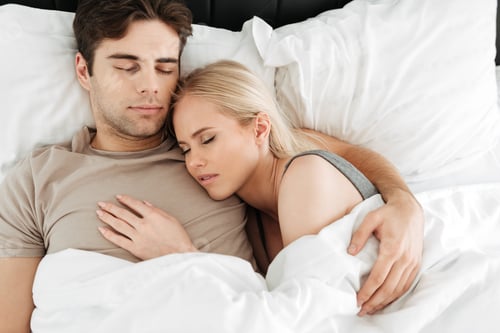 Preview: Portrait Of Calm Handsome Lovers, Young Man And Woman, Sleeping In White Soft Bed And Hugging In