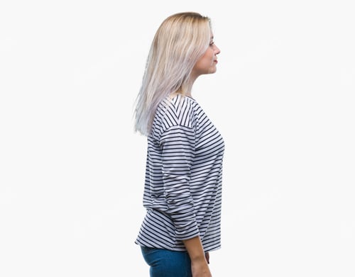 Preview: Young Blonde Woman Over Isolated Background Looking To Side, Relax Profile Pose With Natural Face