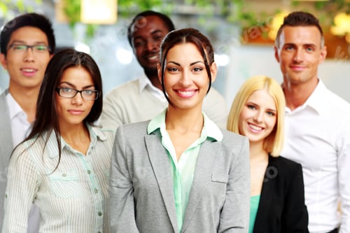 Preview: Happy Group Of Co-Workers Standing In Office