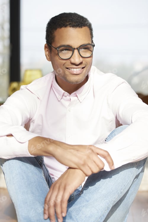 Preview: Shot Of A Young Afro American Man Relaxing At Home.