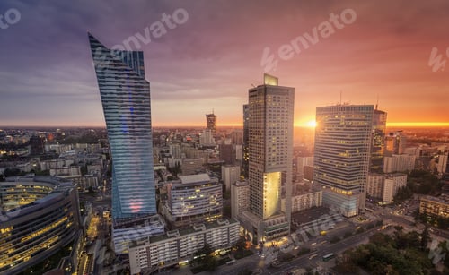Preview: Warsaw Downtown, Poland. Sunset Behind The Building With Lens Flare