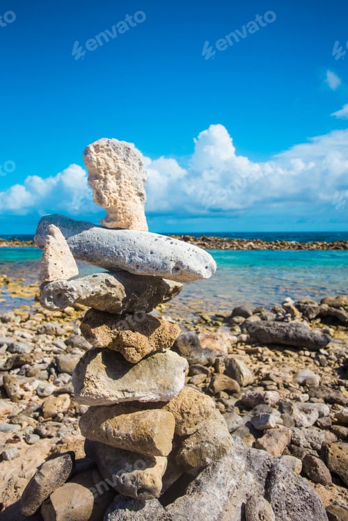 Preview: Stacked Rocks Balance On Rocky Beach In Aruba