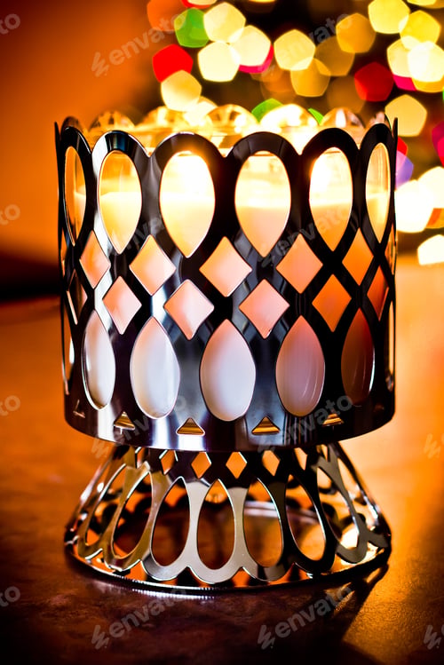 Preview: Golden Glow Of Holiday Candle With Festive Lights