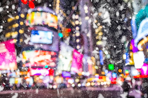Preview: Defocused Blur Times Square New York City Manhattan Street Scene With Cars , Lights And Snowflakes