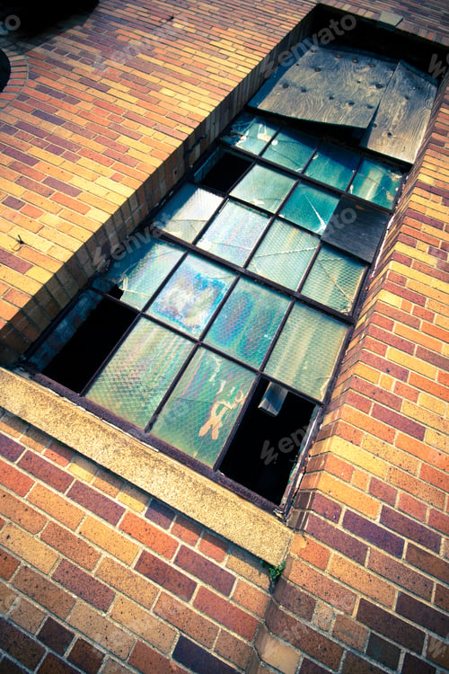 Preview: Broken Windows On Old Industrial Building