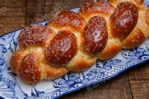 Preview: Sweet Twist Bread, Typical Of Brazilian Bakery, On Dish Decorated In Blue In Rustic Wooden Table