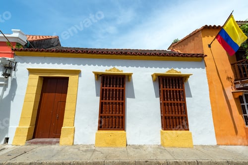 Preview: White Colonial Architecture With A Colombian Flag Visible In Cartagena, Colombia