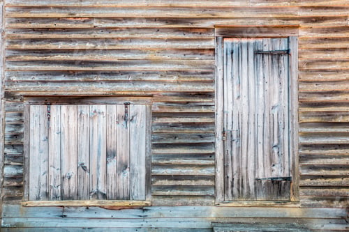 Preview: Old Wooden Structure With Boarded Window And Door