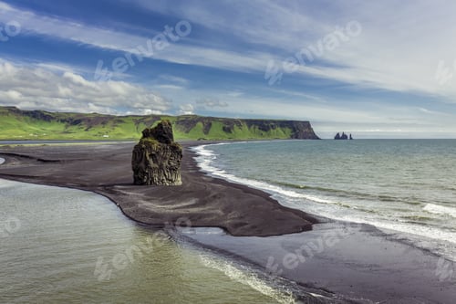 Preview: The Black Sand Beach With Typical Icelandic Mountain Landscapes