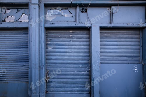 Preview: Steel Shipping Doors On Blue Building