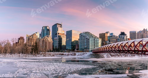 Preview: Evening Skyline View Along The Bow River In Calgary, Alberta. Peace Bridge Visible.