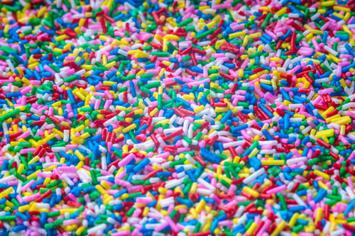 Preview: Colorful Candy Sprinkles Close Up For Birthday Cake On White Background