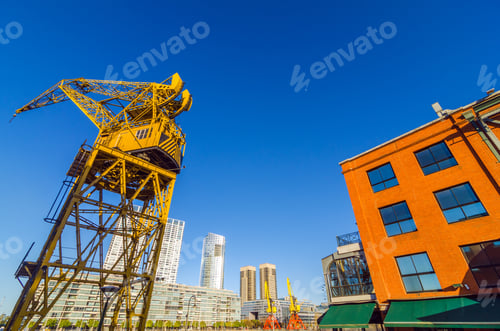 Preview: Yellow Crane Towering Over Skyscrapers In Puerto Madero Neighborhood Of Buenos Aires, Argentina