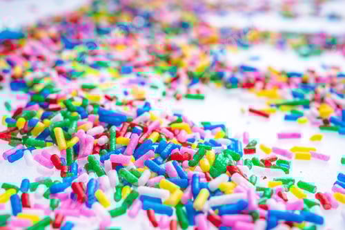 Preview: Colorful Candy Sprinkles Close Up For Birthday Cake On White Background