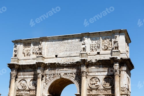 Preview: Top Of The Arch Of Constantine, Rome, Italy, With A Bright Blue Sky Background