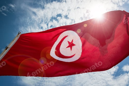 Preview: Tunisian Flag Waving In The Wind With Lens Flare In Monastir, Tunisia