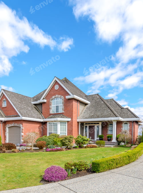 Preview: Luxury Brick House With A Two-Car Garage And Beautiful Landscaping On A Sunny Day In Vancouver