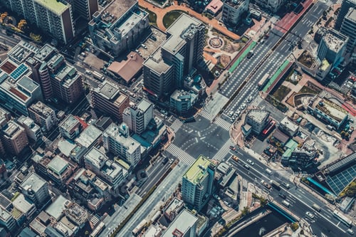 Preview: Aerial View Of Tokyo Street Intersection With Cars And Buildings. Vintage Look