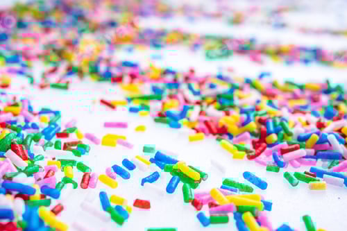 Preview: Colorful Candy Sprinkles Close Up For Birthday Cake On White Background