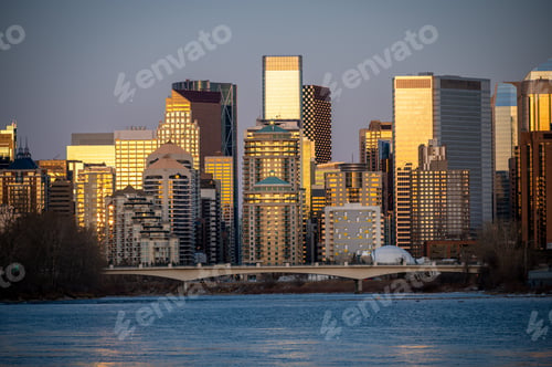 Preview: View Of Calgary'S Skyline Along The Bow River At Dusk.