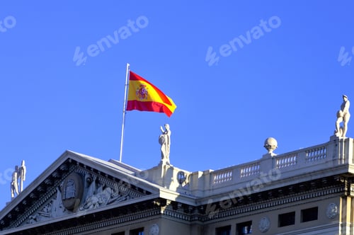 Preview: Spanish Flag Flying Above an Ornate Building