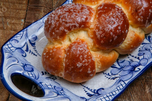 Preview: Sweet Twist Bread, Typical Of Brazilian Bakery, On Dish Decorated In Blue In Rustic Wooden Table