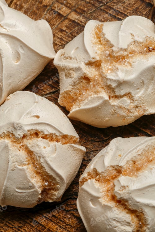 Preview: Traditional Latin American Dessert Called Suspiro Or Meringue. On Wooden Table