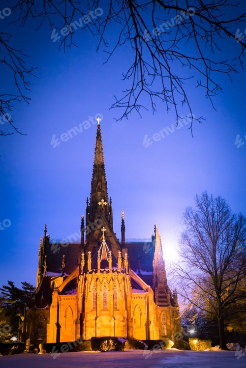 Preview: Beautiful Cathedral Church Seen On A Snowy Winter Night With Moon Glowing In The Background