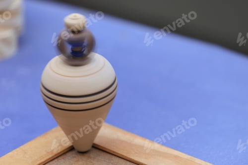Preview: Close-Up Of A Wooden Spinning Top. Vintage Toy