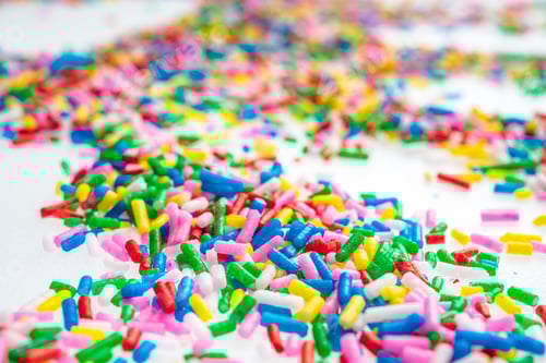Preview: Colorful Candy Sprinkles Close Up For Birthday Cake On White Background