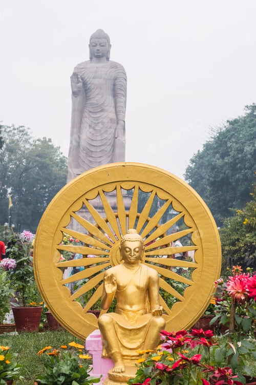 Preview: The Ashok Chakra With Blurry Background Of Grand Statue Of Buddha In Wat Thai Temple. Varanasi