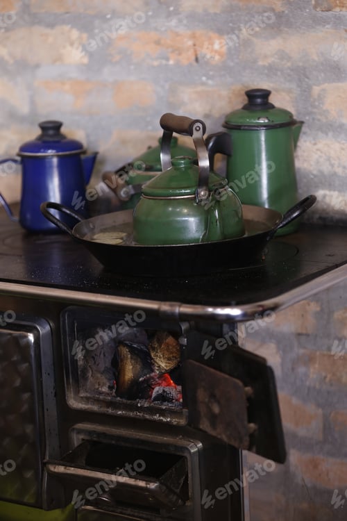 Preview: Warm Fire Heating A Coffee Kettle In Wood Burning Stove. Traditional Style In Countryside Of Brazil