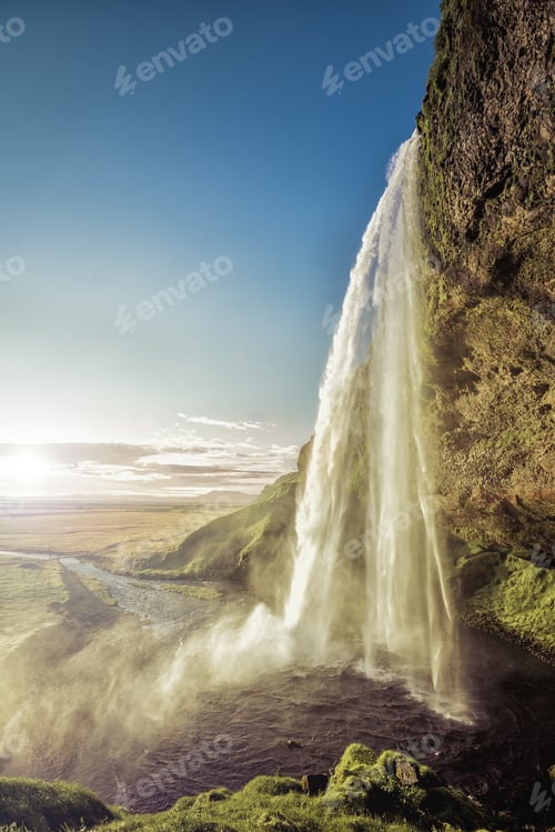 Preview: Seljalandsfoss Waterfall In South Iceland With Sunlight