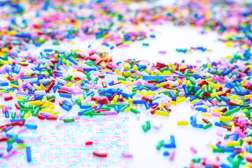 Preview: Colorful Candy Sprinkles Close Up For Birthday Cake On White Background