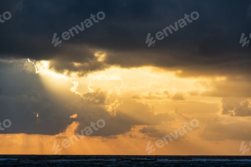 Preview: Rays Of Sunlight Breaking Through The Clouds At Sunrise In Tulum, Mexico