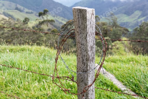Preview: Rusty Barbed Wire Fence Post In Rural Colombia Near Salento