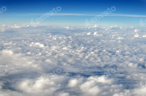 Preview: White Clouds Seen From Above Set Against A Blue Sky