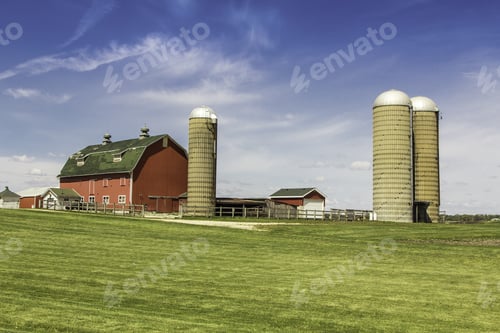 Preview: American Country Farm With Silos Against Blue Sky